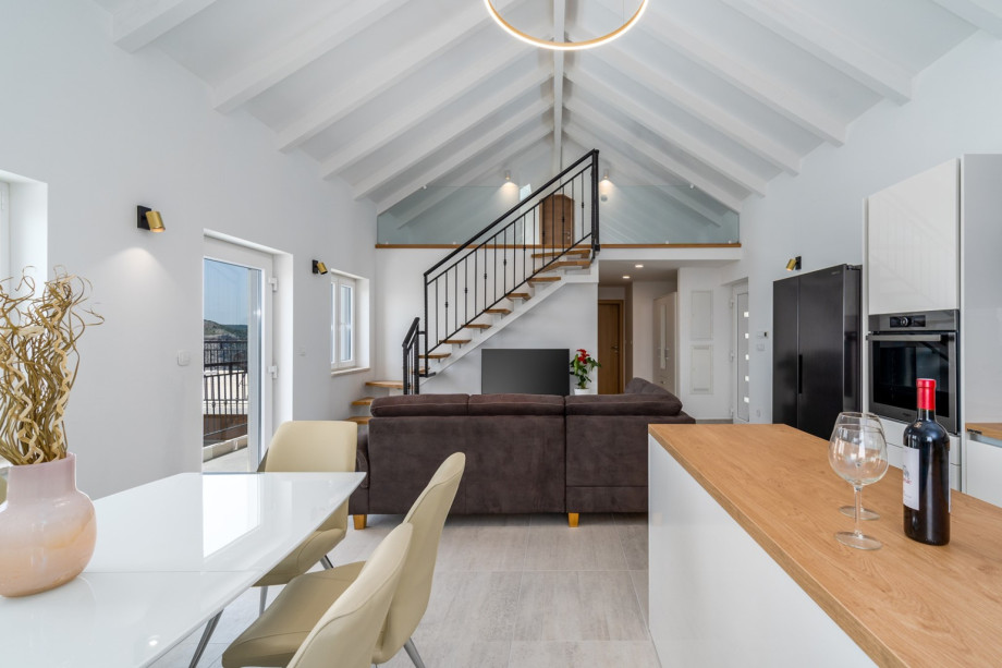 The GROUND floor includes a very light and pleasant living area with a comfortably furnished