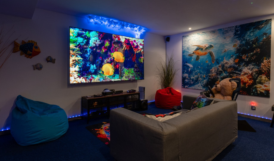 Spacious media room with a PlayStation,a table tennis and lots of toys for the youngest