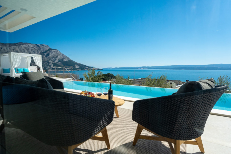 Lounge areas near the outstanding pool, with sea views.