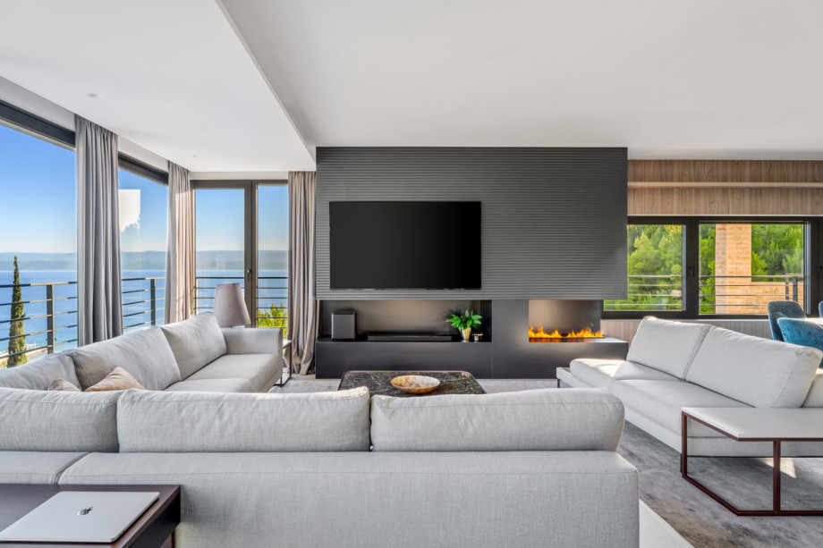 The first floor offers a very stylish and very comfortable living area with a flat-screen TV, A/C