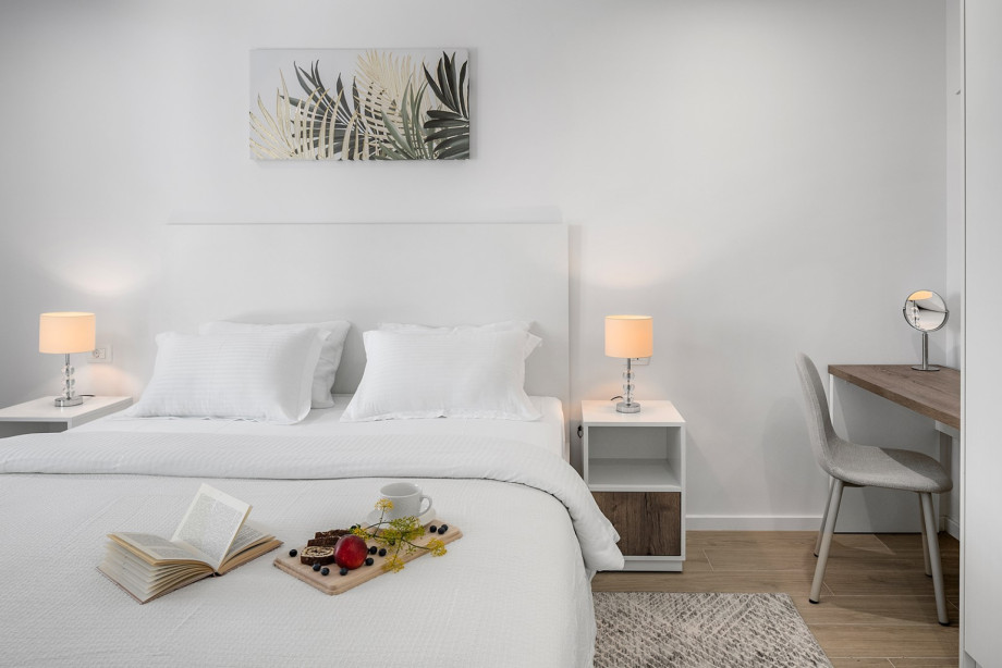 Bedroom NO 3 with aTV, air conditioning, and sliding door to the pool area