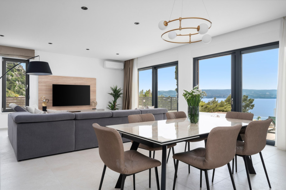 Villa Una has a very comfortable sofa, a flat-screen TV with satellite channels, free WiFi, and a dining table for 8 people