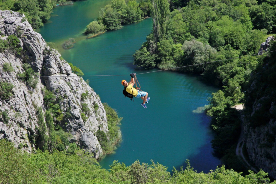 Omiš and Cetina River with many attractions and activities like rafting, zip-line above Cetina River, free climbing, and boat tour options.