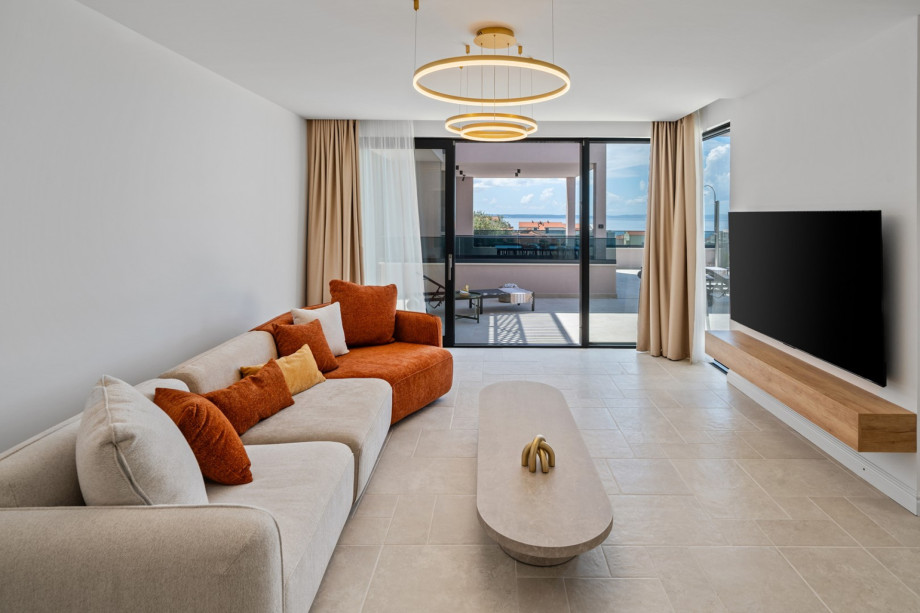 Living room with comfy sofas and smart TV