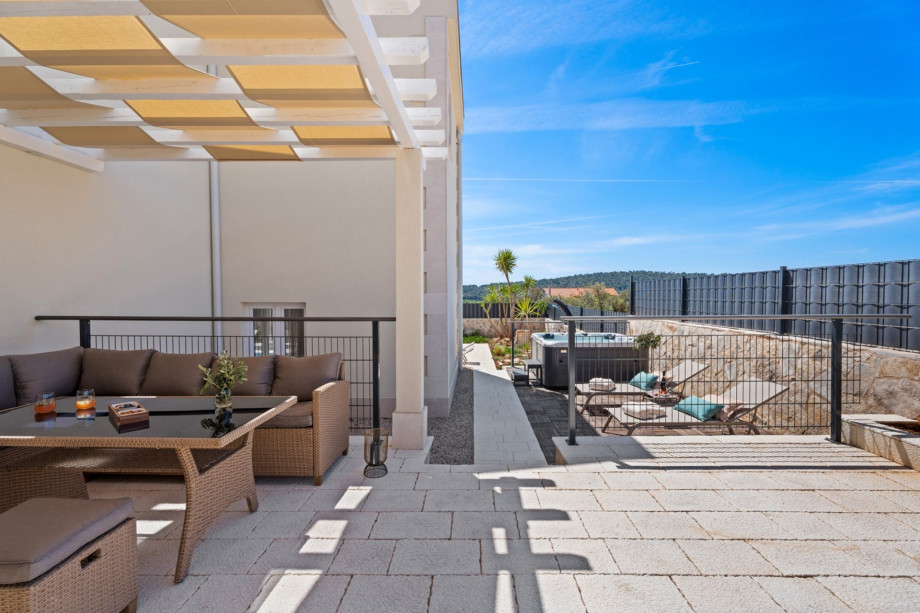 A comfortable lounge corner next to the pool area