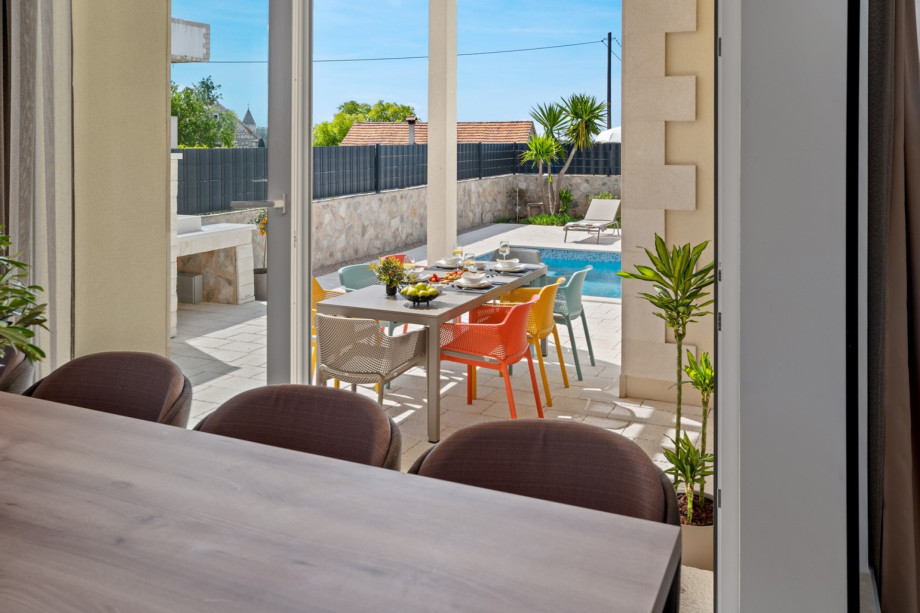 The kitchen is equipped with a Microwave oven, a Lavazza capsule coffee maker, a toaster, and a kettle