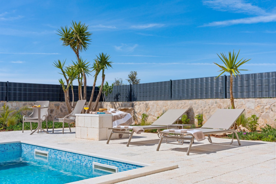 There are 8 deck chairs at the sun deck area.