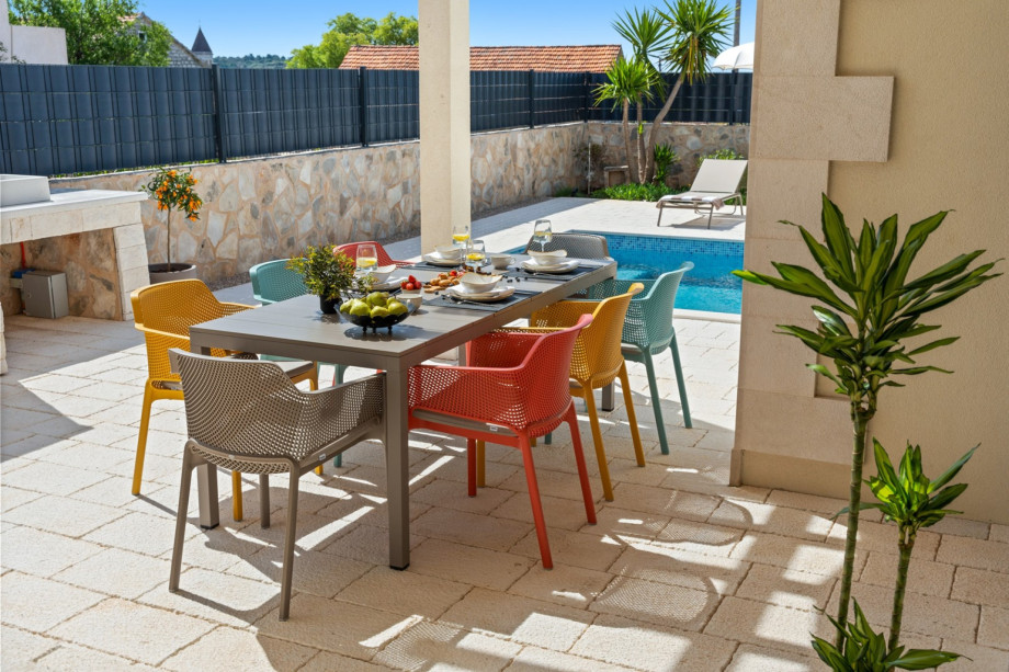 Covered outdoor dining and lounge area