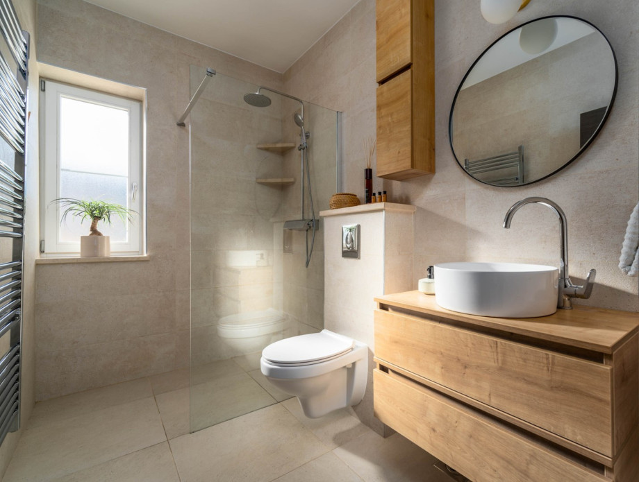 The ground floor level offers a family bathroom with a shower.
