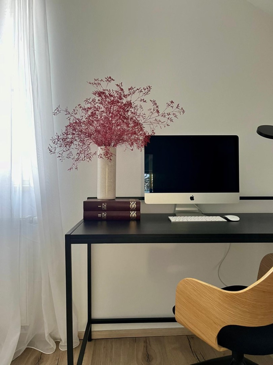 Villa Ani offers a stylish office setup with a sleek desk and a comfy chair, so you can pretend to work while you’re planning your next poolside nap