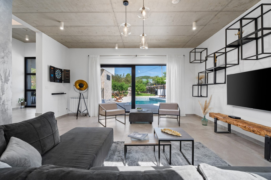 open space concept of living and dining area and fully equipped kitchen