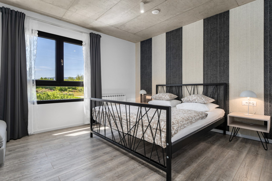 Bedroom NO1 with king size bed 180x200cm + a sofa bed for 1 person, TV, A/C,bath