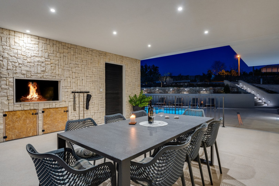 outdoor dining area with BBQ