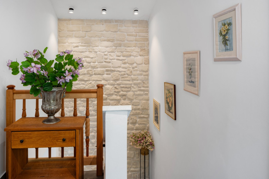 Absolutely spacious interior where you can notice style and comfort in the furniture and tradition in the stone detail