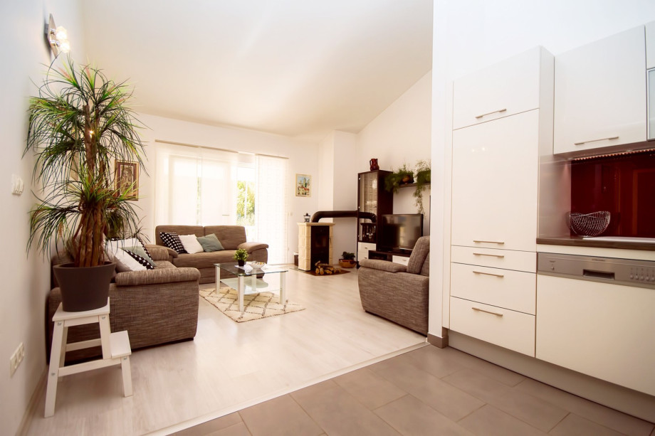 Kitchen area is connected with dining and living room.