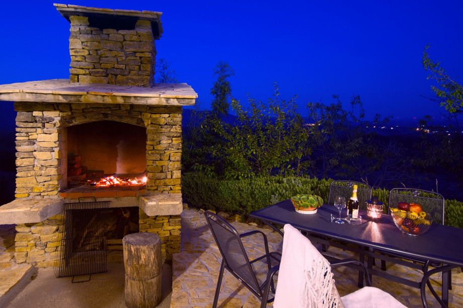 Traditional barbecue and second outdoor dining area.