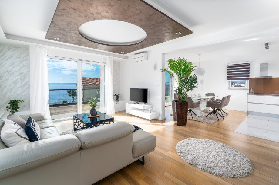 Living and dining area in apartment on the 1st floor with open sea view