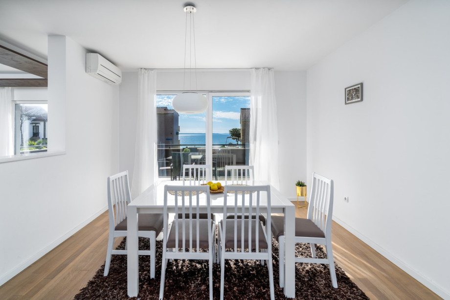 Dining room on the ground floor with open sea view