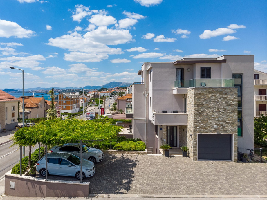 Parking place for 6 cars next to the property and one garage place