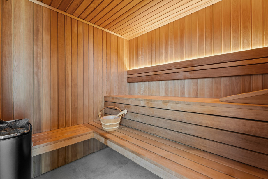 The spa area with a sauna and jacuzzi is the perfect spot for a relaxing