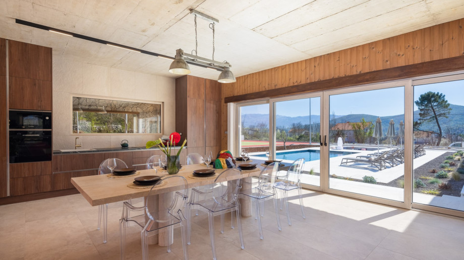 The dining space accommodates up to 8 guests