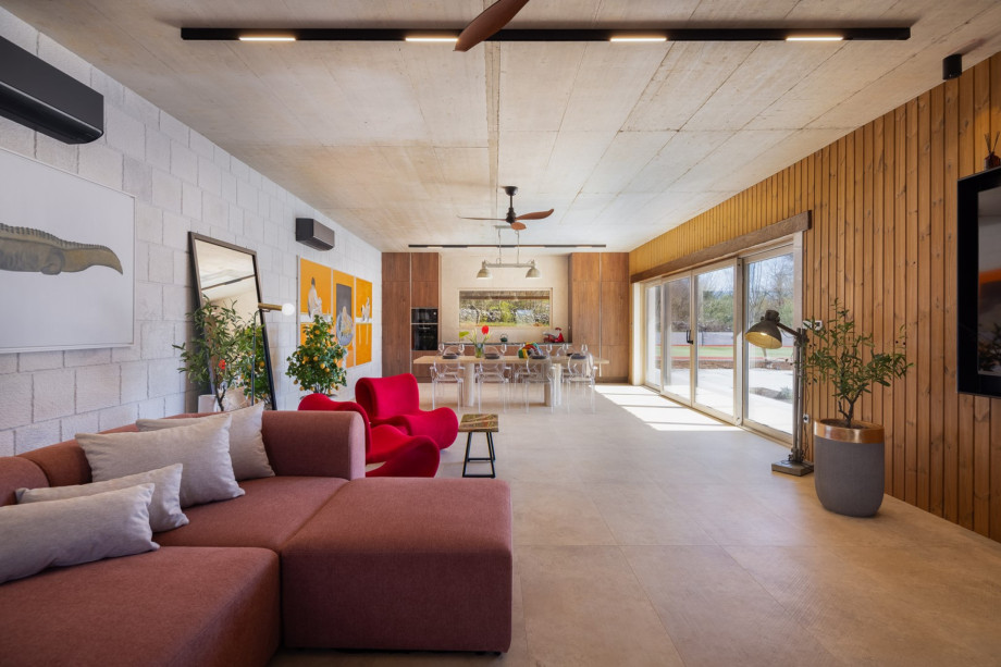 Sliding glass doors to the stunning outdoor areas, seamlessly connecting indoor comfort with nature's beauty