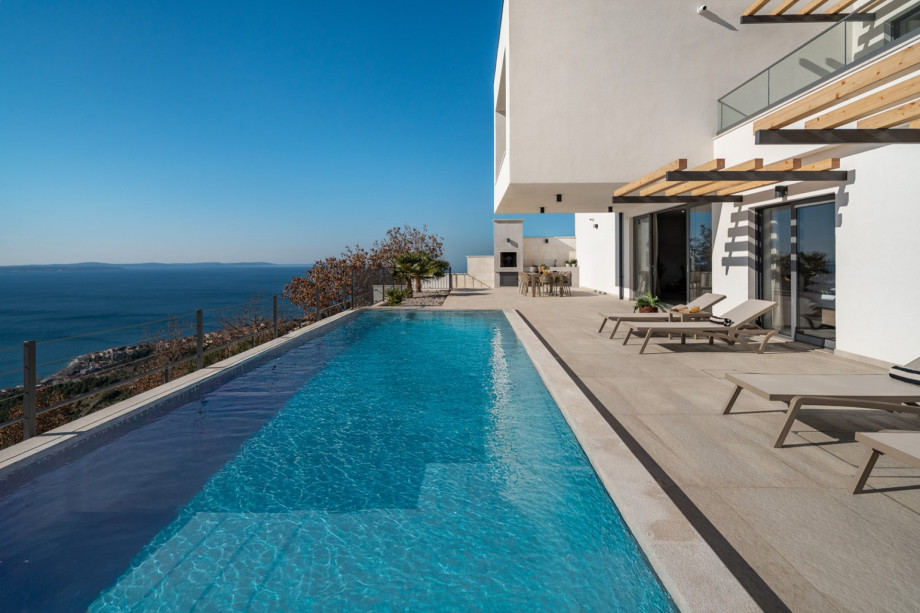 The private 9.5m x 3.4m pool features skin-friendly filtration and stunning views of the Dalmatian coast.