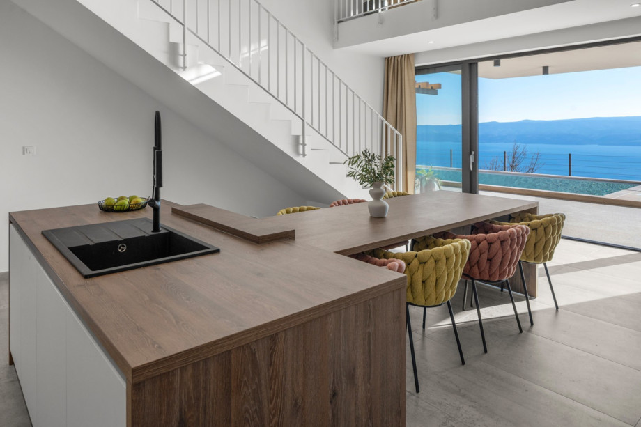 The modern kitchen area is designed to meet all the needs of a modern guest.