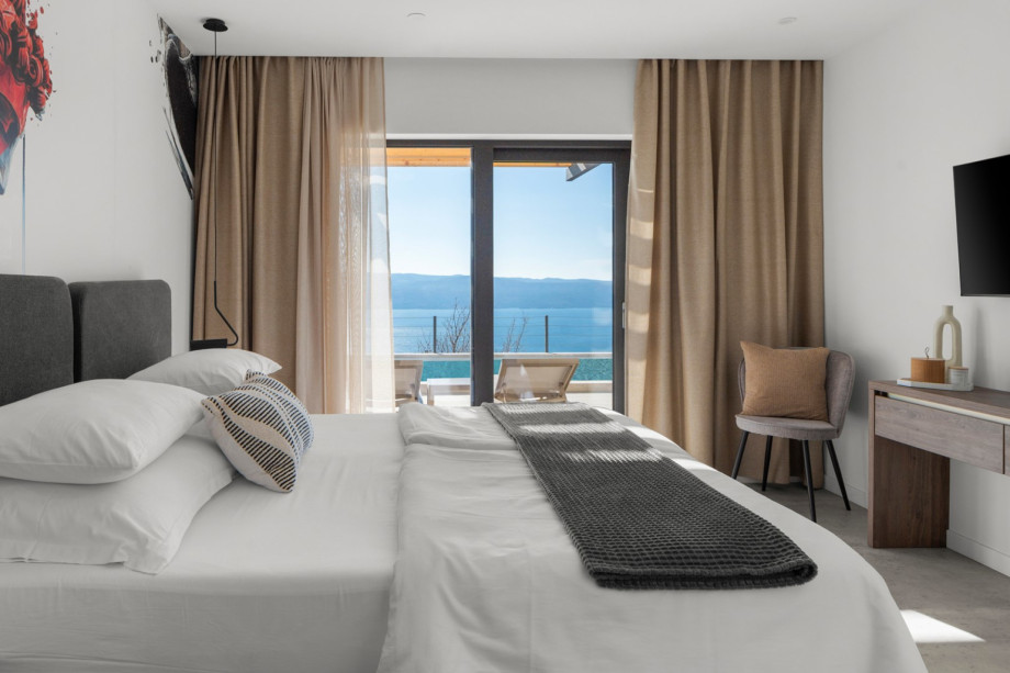 Stylishly equipped bedroom providing a comfortable and enjoyable stay.