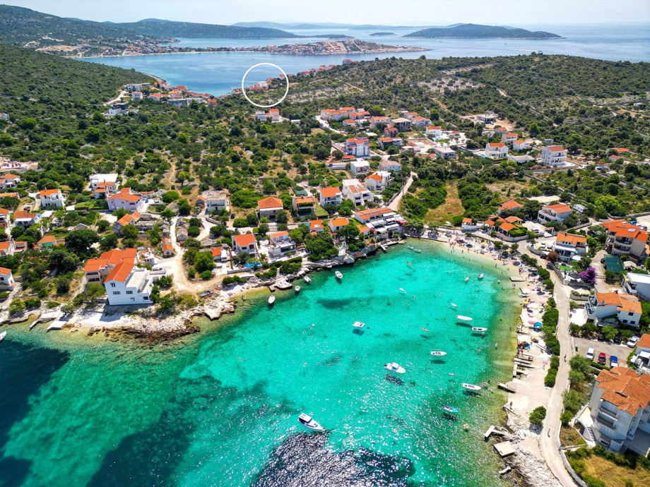 take a short 3-min walk to the sandy beach