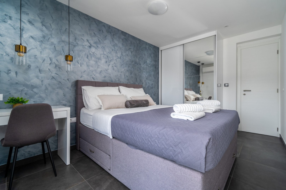 Bedroom No3 with queen size bed 160cmx200cm,a TV, terrace with a sitting area