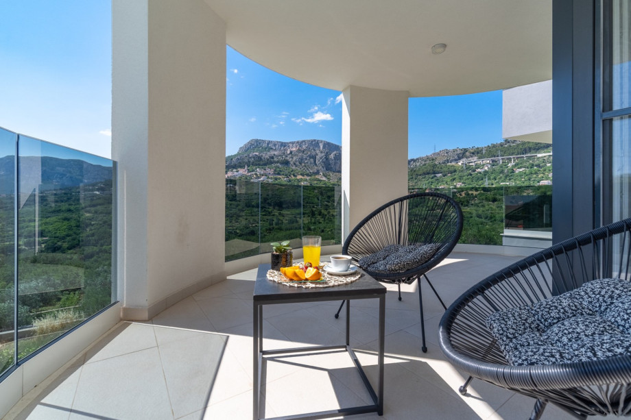 a large terrace with sitting area and amazing views