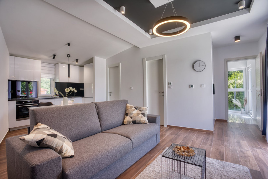 a fully equipped kitchen, dining area, a living room with a sofa (that converts into a sofa bed), TV, free WiFi, A/C