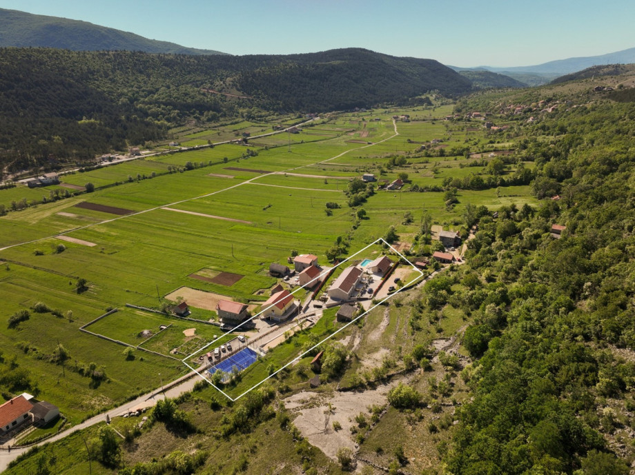 This luxury villa features a highly sought-after padel court located just across from the main house.