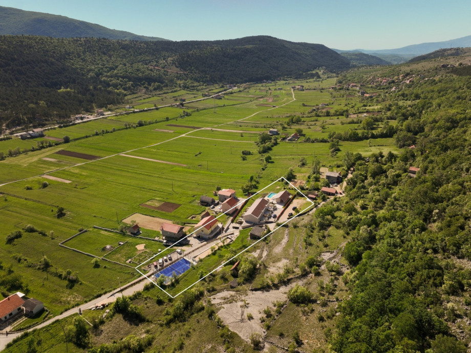 This luxury villa features a highly sought-after padel court located just across from the main house.