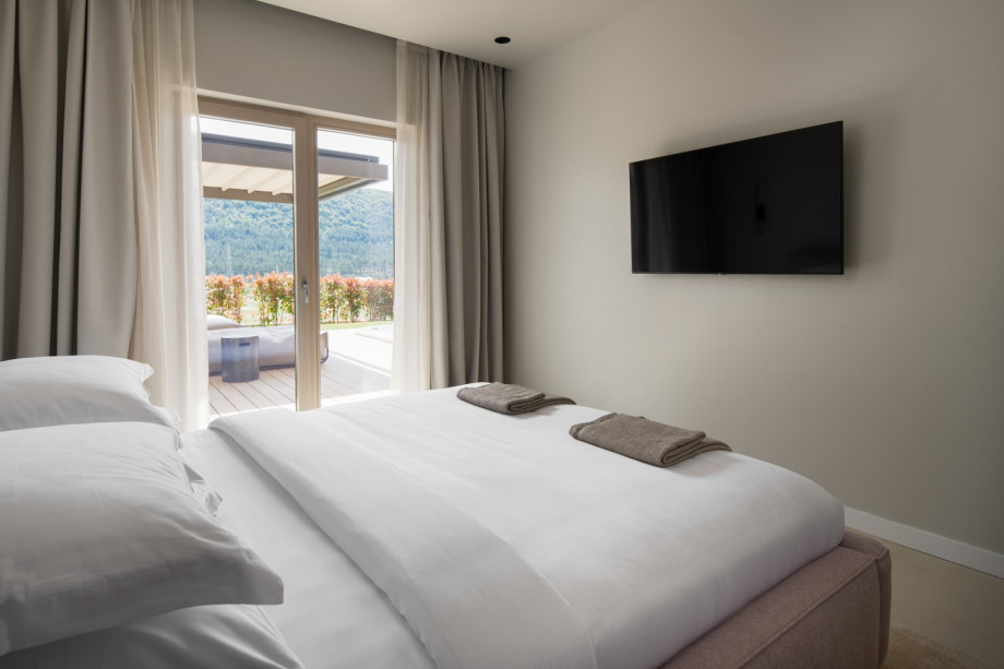 Beautifully appointed bedrooms come equipped with flat-screen TVs and offer stunning landscape views.