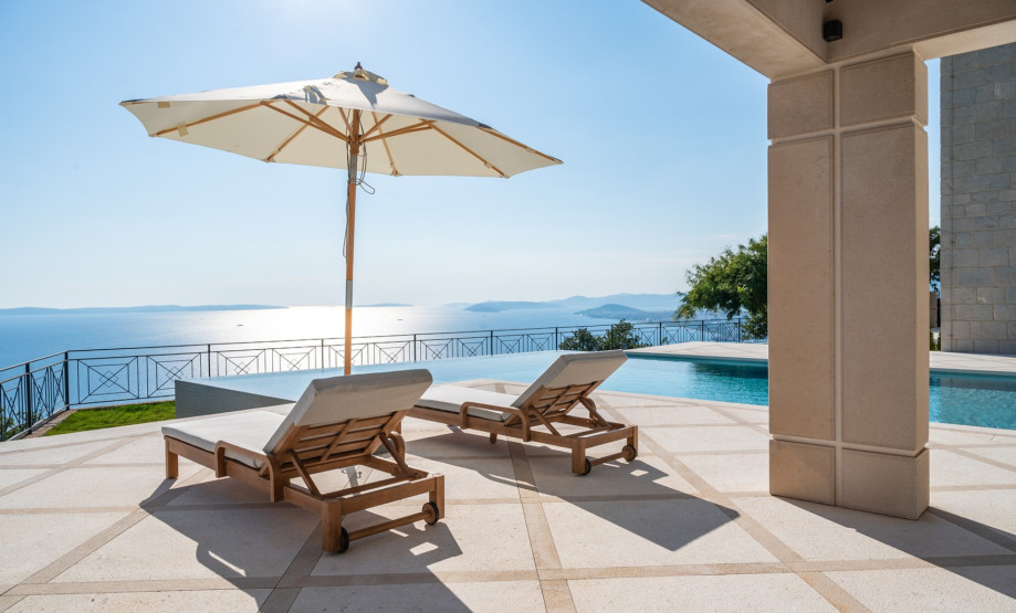 The spacious sun deck is equipped with lounge chairs for six, ideal for soaking up the Mediterranean sun.