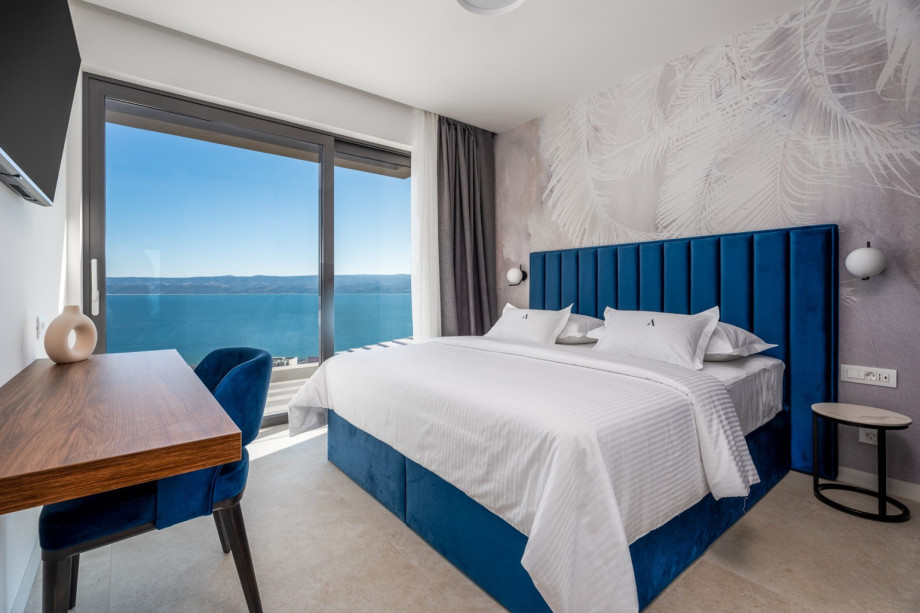 Bedroom No4 (22 sqm) with a king size 180cm x 200cm, A/C, TV.