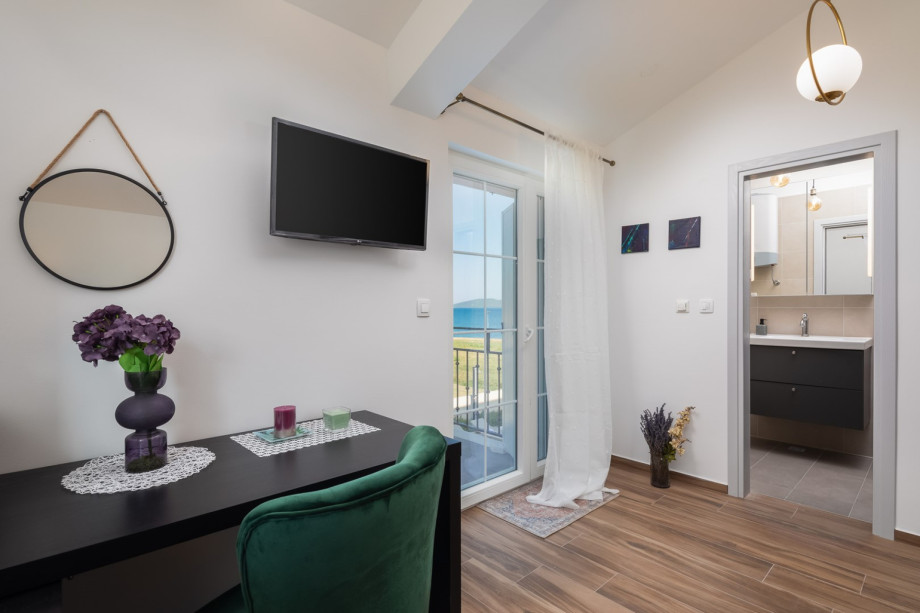 A separate terrace with two deck chairs on the northwest side provides a tranquil spot to unwind