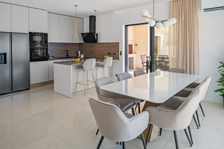 Contemporary kitchen has everything you need for a comfortable stay