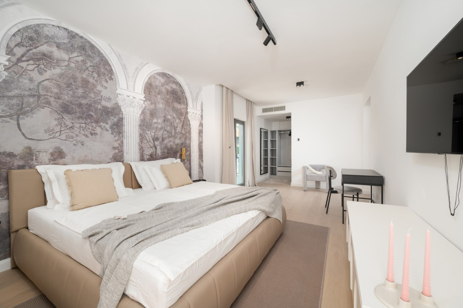 Bedroom NO3 (15,2sqm) with super king size bed 200x200 (can be separated into two singles), A/C, a TV, en-suite bathroom with a shower,  a balcony, and sea-views