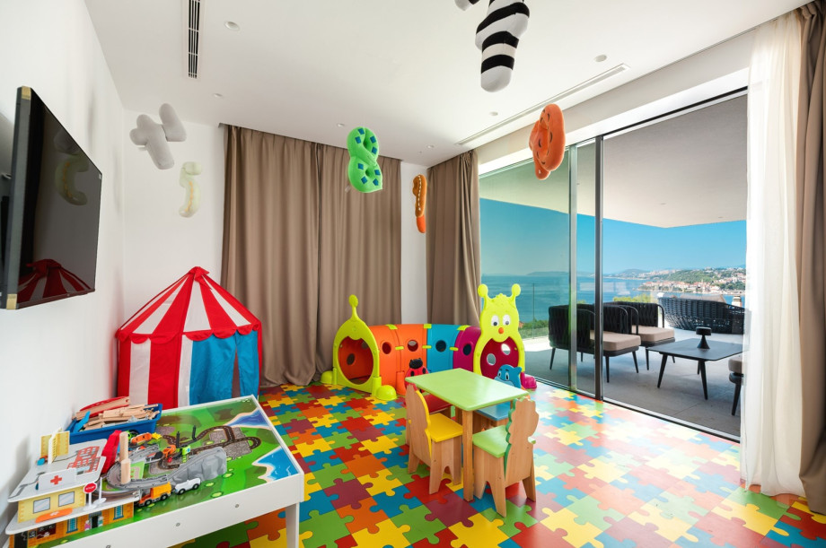 There is also a playroom for your little ones with a TV, various toys, and other entertainment for young people