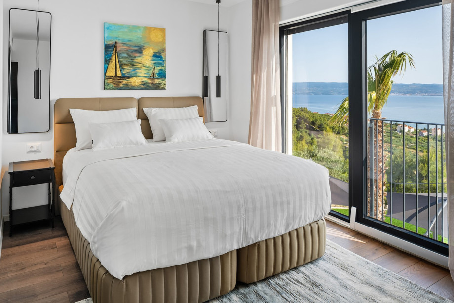 Schlafzimmer 1: 17,5 m2, Kingsize-Bett (180x200 cm)