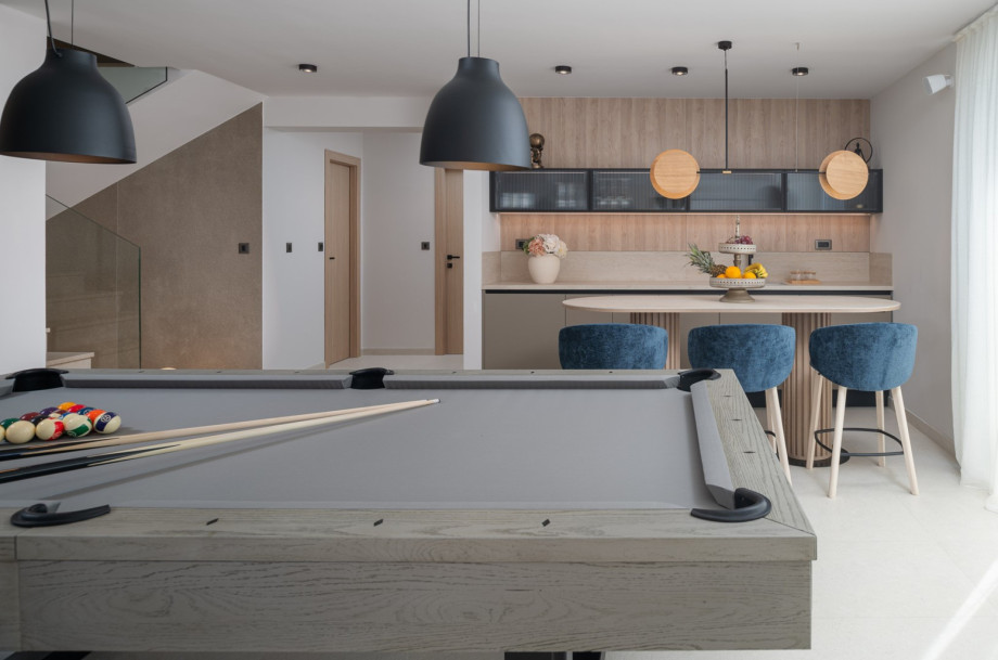 * Enjoy a beautifully designed fun and spa zone equipped with a billiards table, cozy sofa, bar area, air conditioning, and kitchenette.