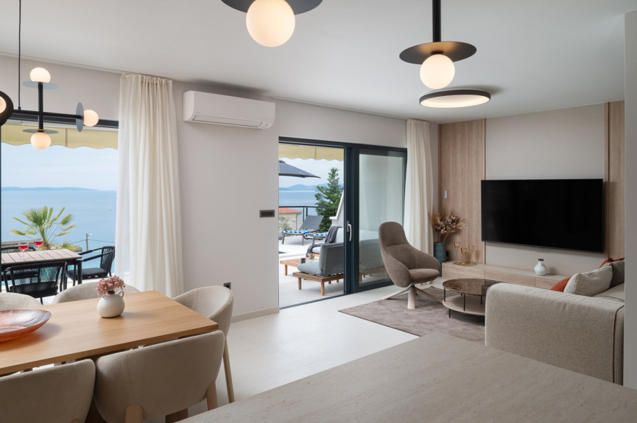 This floor also houses two bedrooms with their own bathroom.