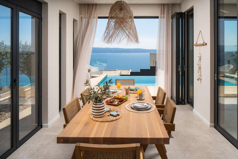 Complemented by a gas barbecue for delightful outdoor meals.