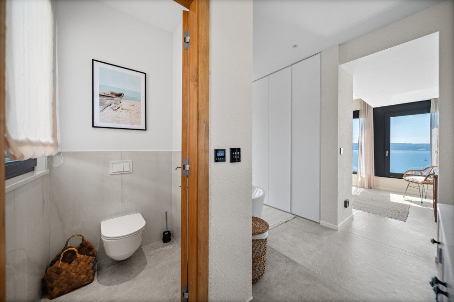 En-suite bathroom  with a shower and a toilet