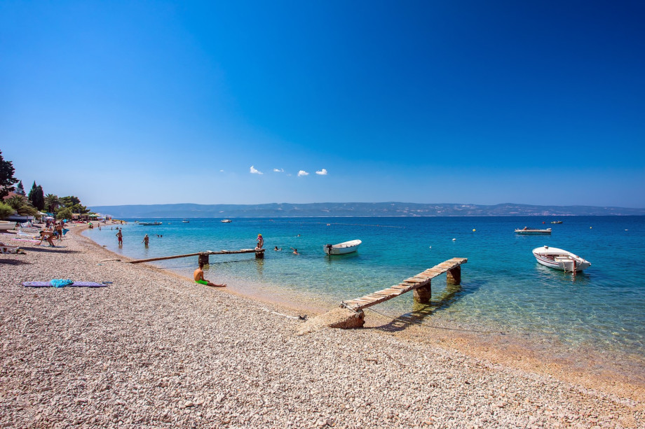 Pebble beaches in Stanići with crystal clear sea