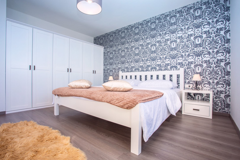 Bedroom No2 with king size bed, sofa bed for 1 person, exit to terrace with sea and pool view, A/C, TV, en-suite Bathroom No2 with shower