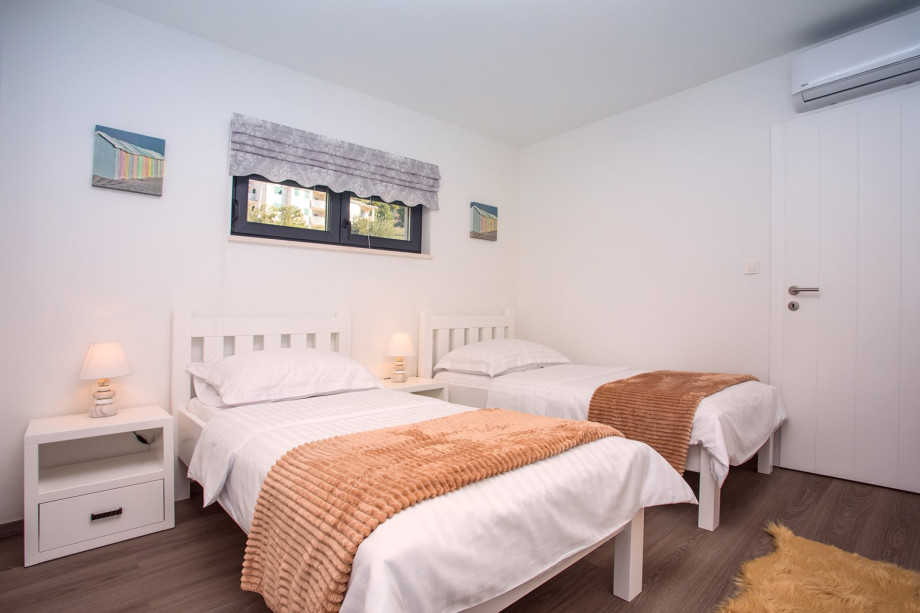 Bedroom No3 with 2 single beds and A/C, TV, first floor